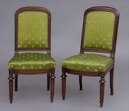 Appraisal: PAIR OF EARLY VICTORIAN CARVED WALNUT SIDE CHAIRS Each with