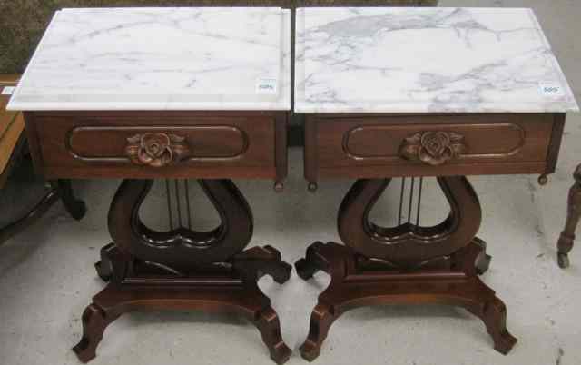 Appraisal: A PAIR OF VICTORIAN STYLE LAMP TABLES American th century