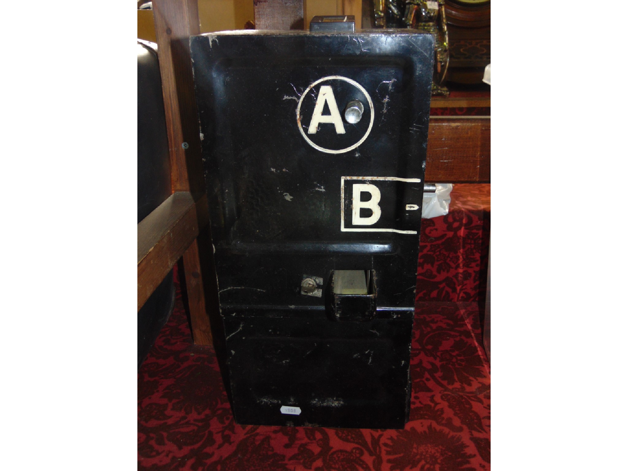 Appraisal: A th century commercial telephone receiver unit with ebonised finish