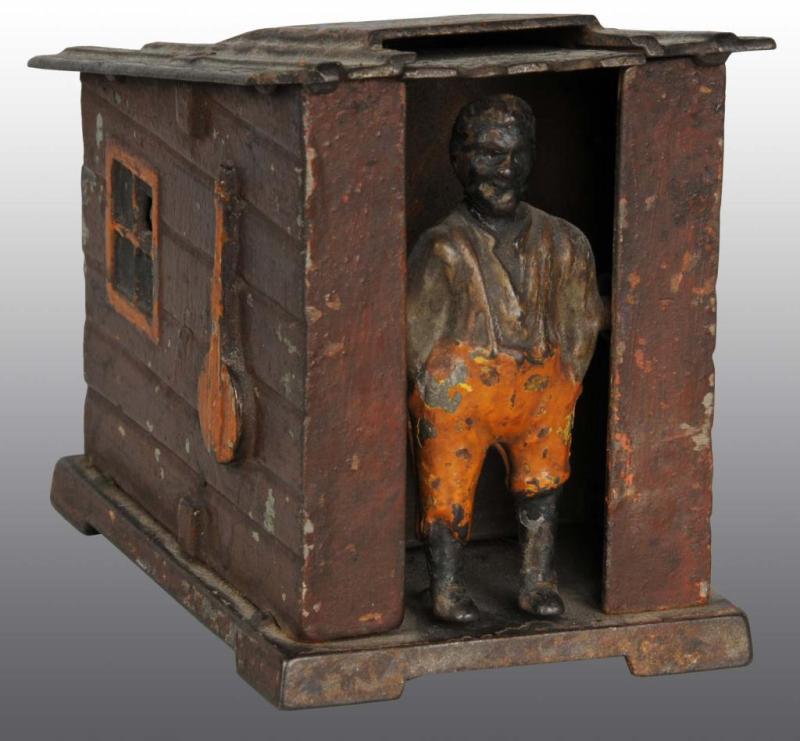 Appraisal: Cast Iron Cabin Bank Mechanical Bank Description Manufactured by J