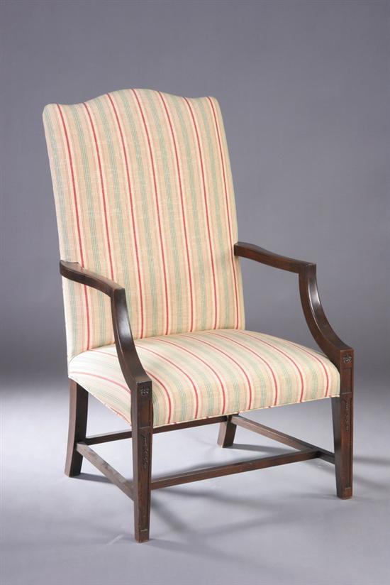 Appraisal: AMERICAN FEDERAL STYLE MAHOGANY LOLLING CHAIR th century Crested high