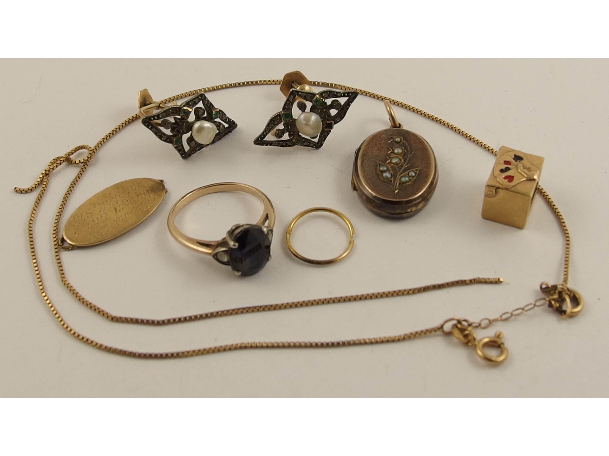 Appraisal: A collection of gold and yellow metal items to include