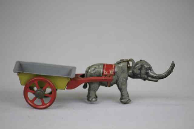 Appraisal: ELEPHANT CART WITH NODDING HEAD PENNY TOY Fischer Germany nicely