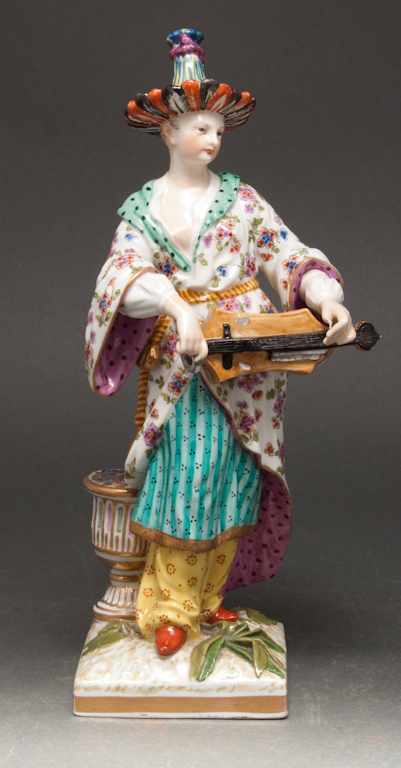 Appraisal: German porcelain Malabar musician female figure with hurdy-gurdy th century