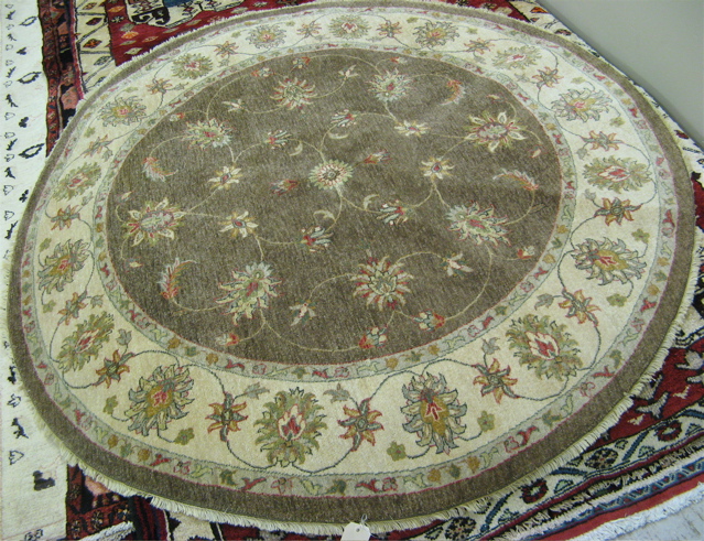 Appraisal: ROUND PAKISTANI-PERSIAN AREA RUG ' diameter