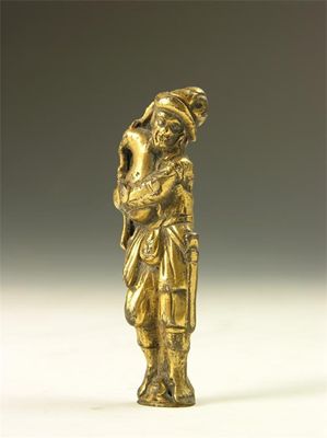 Appraisal: A gilt bronze figure of a bagpiper wearing th century