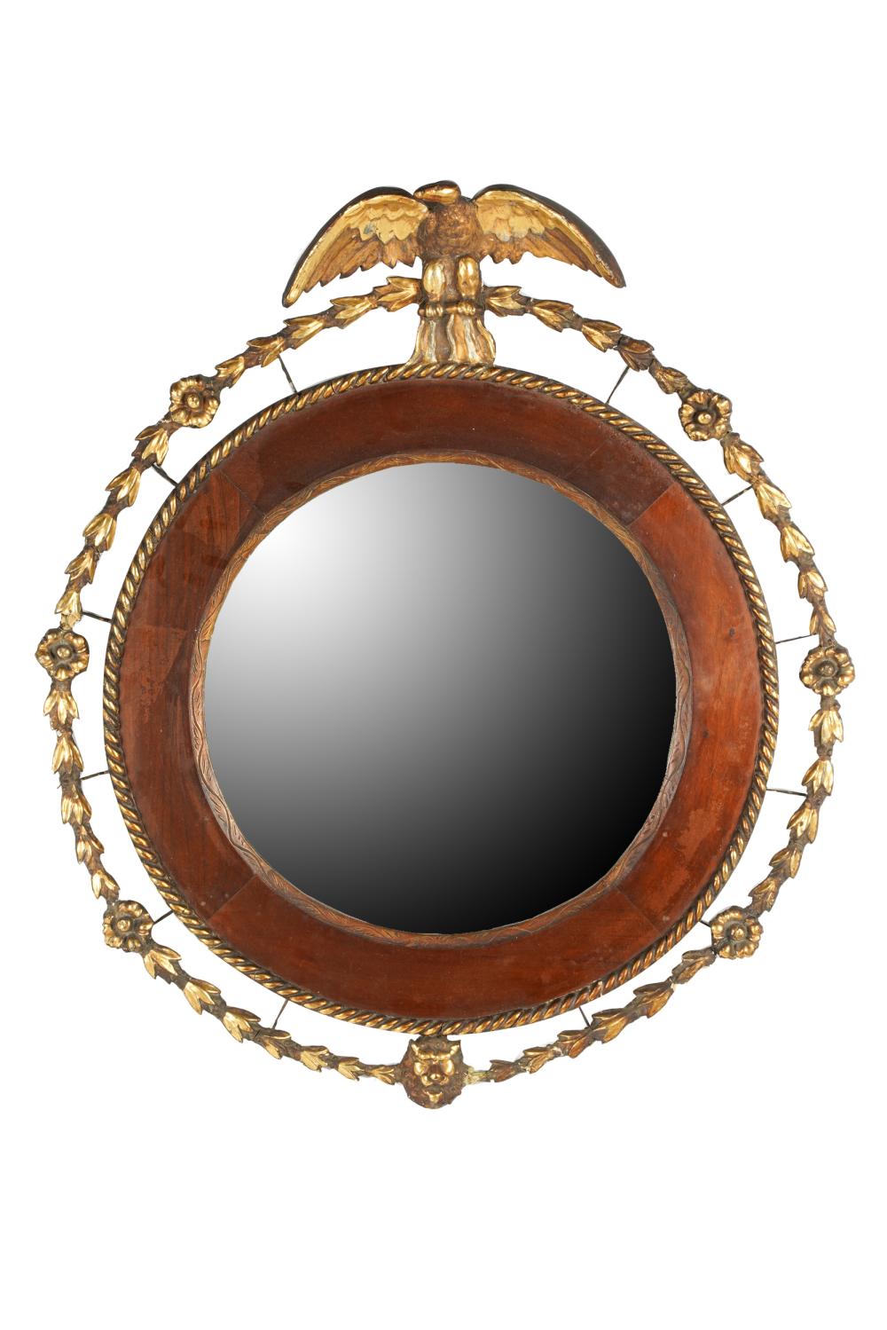 Appraisal: FEDERAL STYLE MAHOGANY PARCEL GILT MIRRORthe round frame crested by