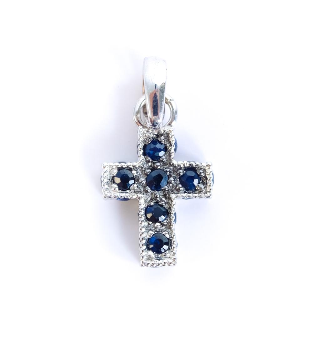 Appraisal: K WHITE GOLD SAPPHIRE CROSS PENDANT K white gold cross