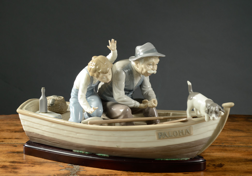 Appraisal: LLADRO PORCELAIN FIGURINE Fishing with Gramps sculptor Jose Puche issued