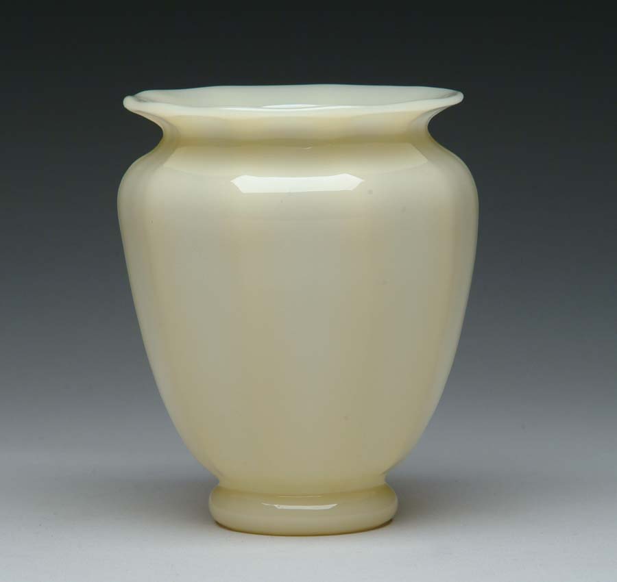 Appraisal: STEUBEN IVORENE VASE Wonderful ivorene vase has ribbed body with