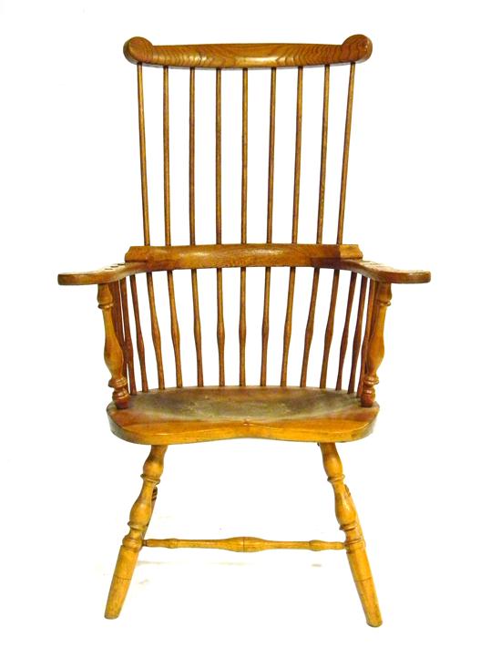 Appraisal: Windsor armchair th C high comb back nine spindle back