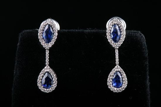 Appraisal: PAIR PLATINUM SAPPHIRE AND DIAMOND DROP EARRINGS Pear-shaped diamond drop