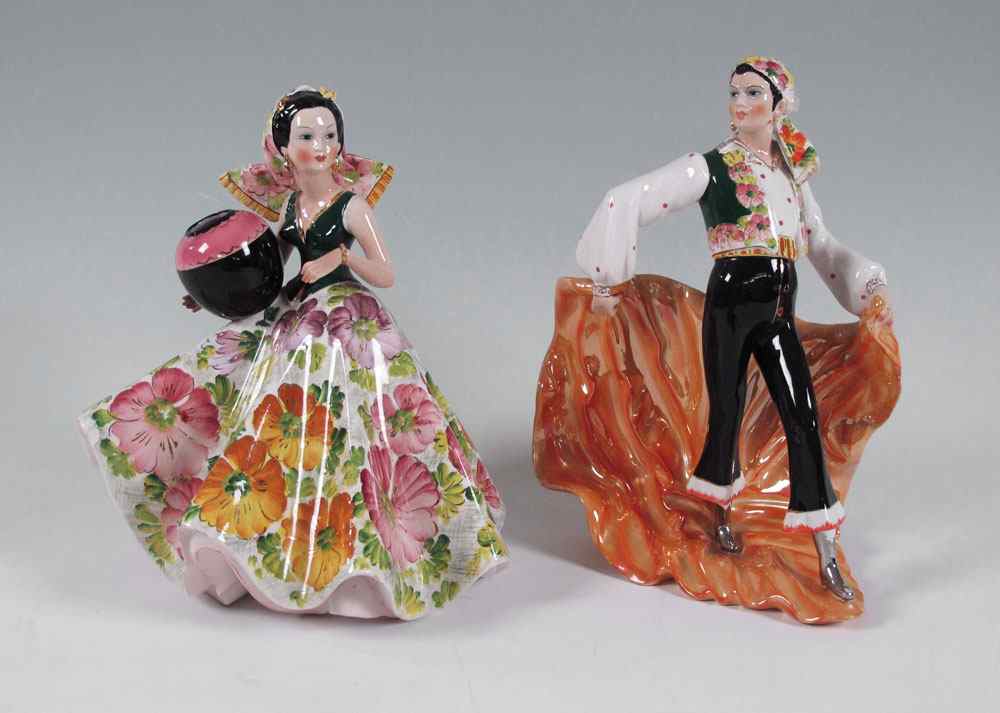 Appraisal: VINTAGE GIRARDI PORCELAIN DANCER FIGURES Brightly colored dancers man and