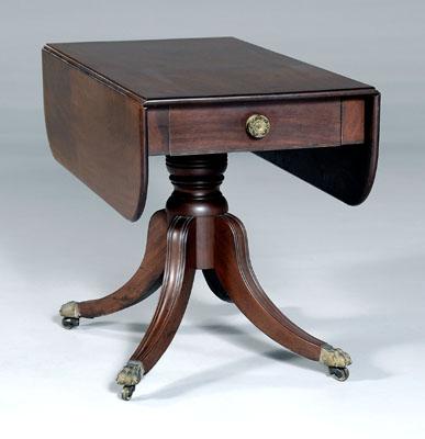 Appraisal: Classical mahogany breakfast table shaped drop leaves dovetailed drawer brass