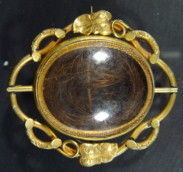 Appraisal: Victorian gold plated reversible locket with hair