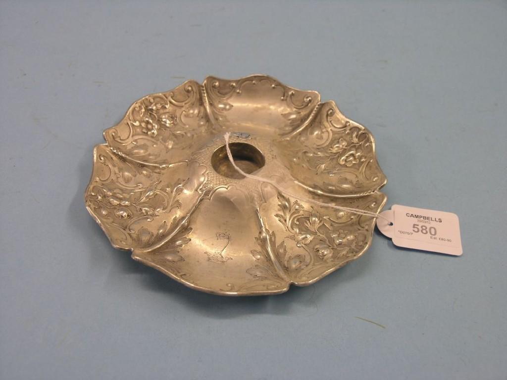 Appraisal: A Victorian silver candle stand hexagonal-shape embossed with flowers London