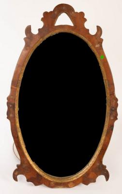 Appraisal: An oval mahogany wall mirror with carved border cm x