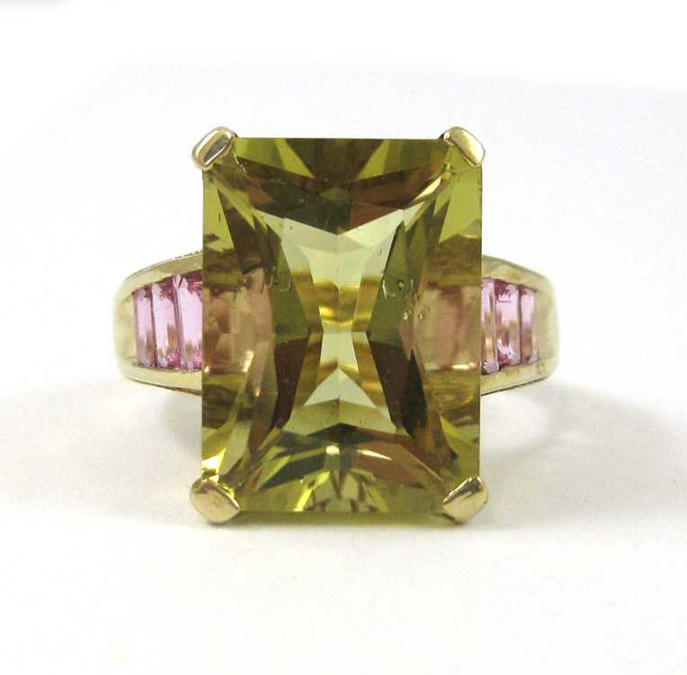 Appraisal: LEMON CITRINE AND PINK SAPPHIRE RING k yellow gold with