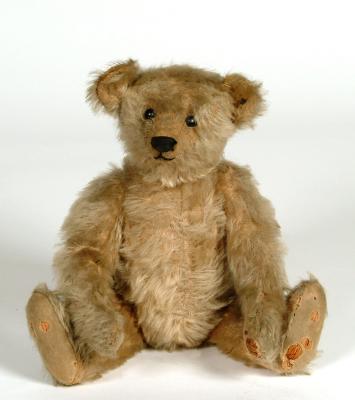 Appraisal: An early th century Steiff teddy bear straw filled covered