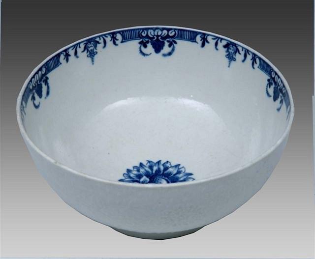 Appraisal: A WORCESTER BLUE AND WHITE BOWL with relief moulded decoration