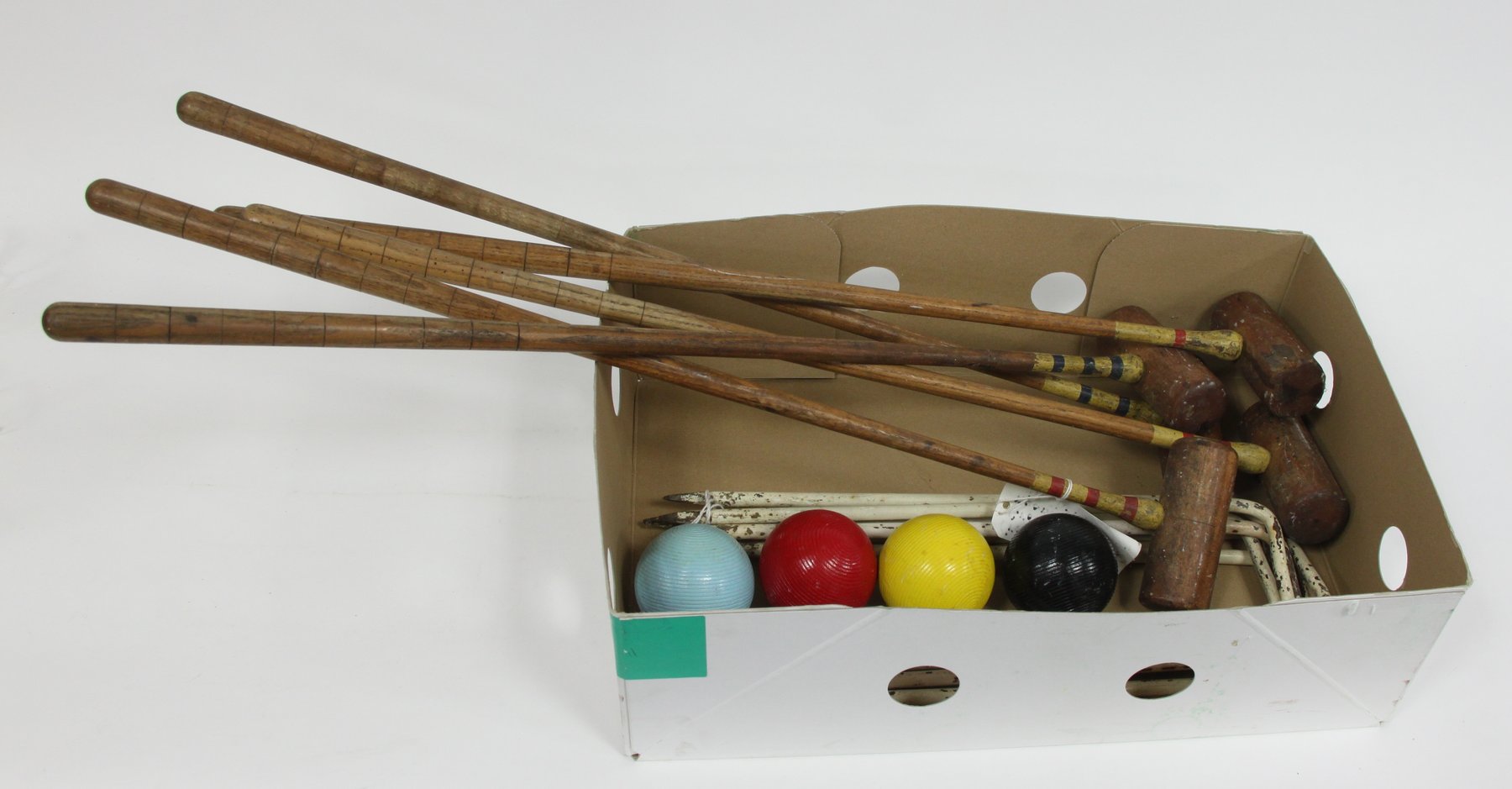 Appraisal: A croquet set of five mallets five hoops and four