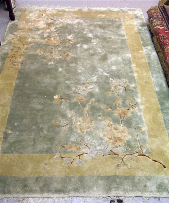 Appraisal: Chinese silk and wool rectangular carpet with a light green