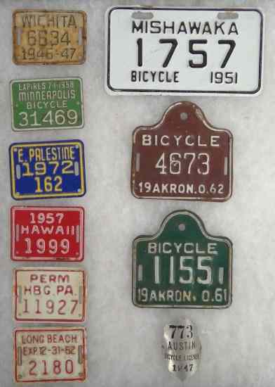 Appraisal: Lot license plates badges ''Wichita Minneapolis Hawaii Long Beach Akron