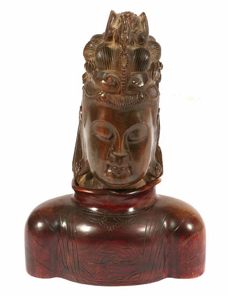 Appraisal: A molded composition head of Guanyin height in width in