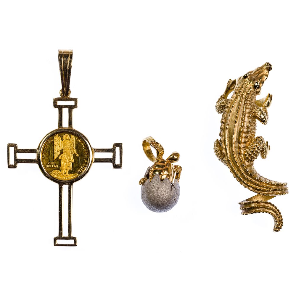 Appraisal: K GOLD PENDANT ASSORTMENT pendants including an alligator a turtle