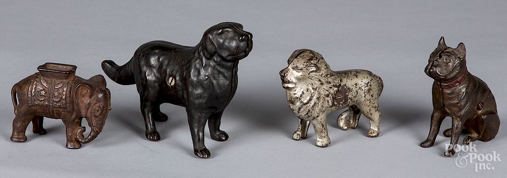 Appraisal: Four cast iron animal still banks Four cast iron animal