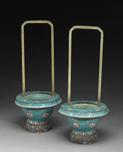 Appraisal: A pair of cloisonn enamel decorated flower vases Each fashioned