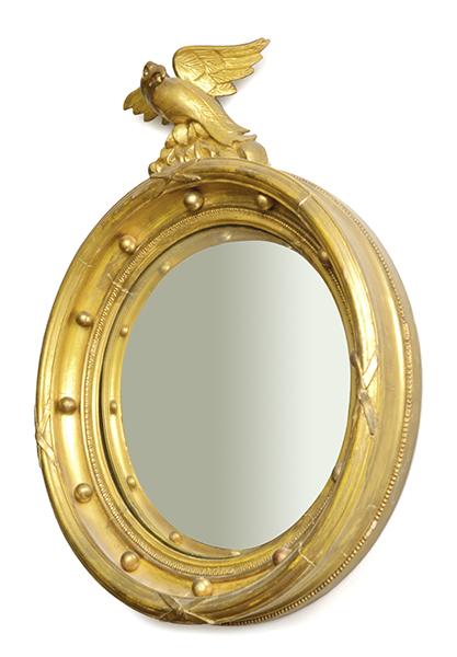 Appraisal: A FRENCH EMPIRE STYLE GILT WOOD FRAMED CONVEX MIRROR with