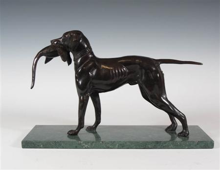 Appraisal: A bronze sculpture of a pointer carrying a pheasant in