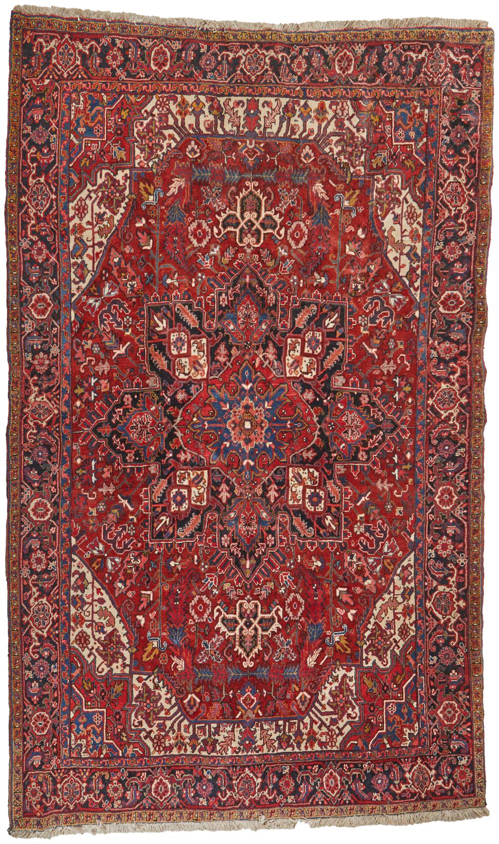 Appraisal: A Persian Heriz Rug Second-quarter th Century Wool on cotton