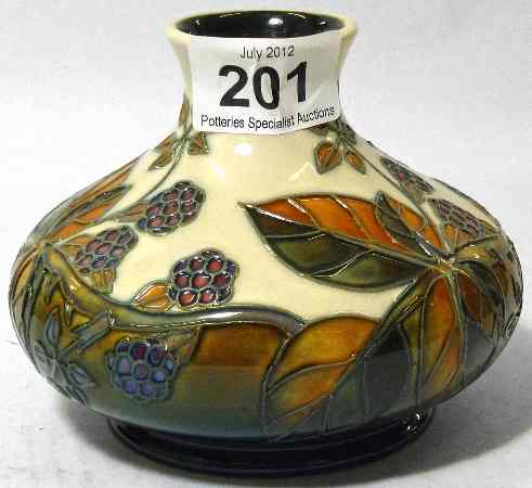 Appraisal: Moorcroft squat vase decorated with Blackberry and Leaves design height