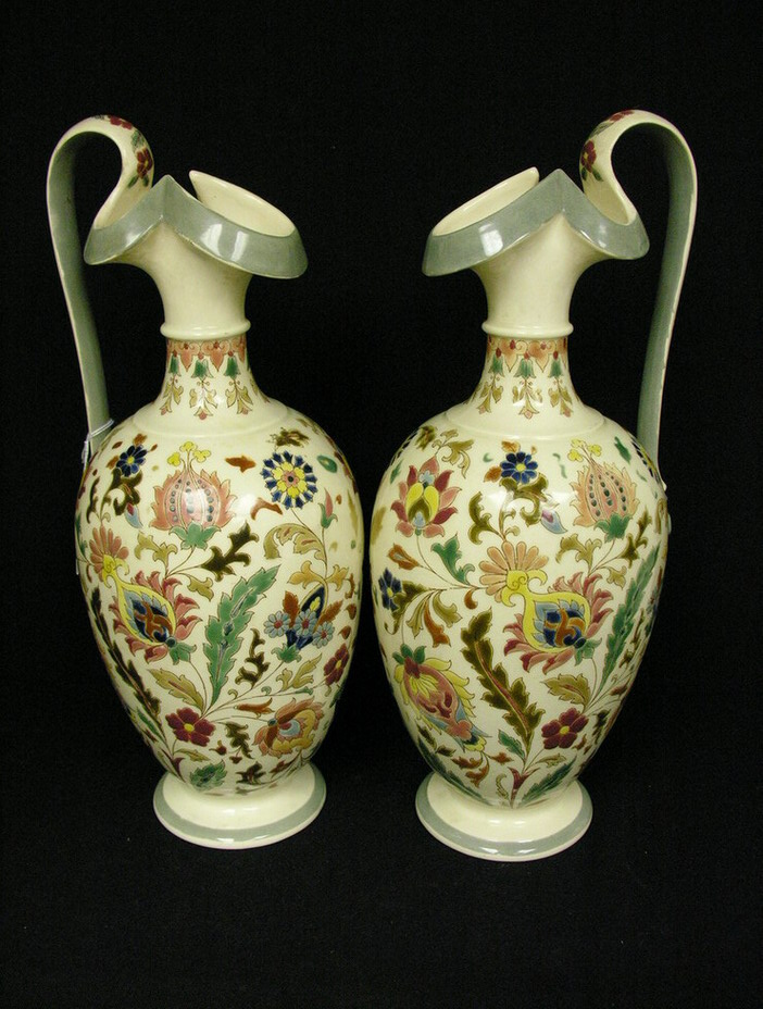 Appraisal: PAIR LARGE PORCELAIN EWERS Stylized flower motif Impressed GEY on