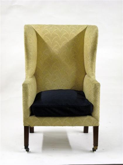 Appraisal: George I style wing armchairWith a high enclosed back over