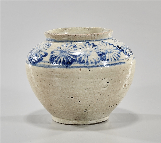 Appraisal: Korean white glazed ceramic jar with blue floral design to