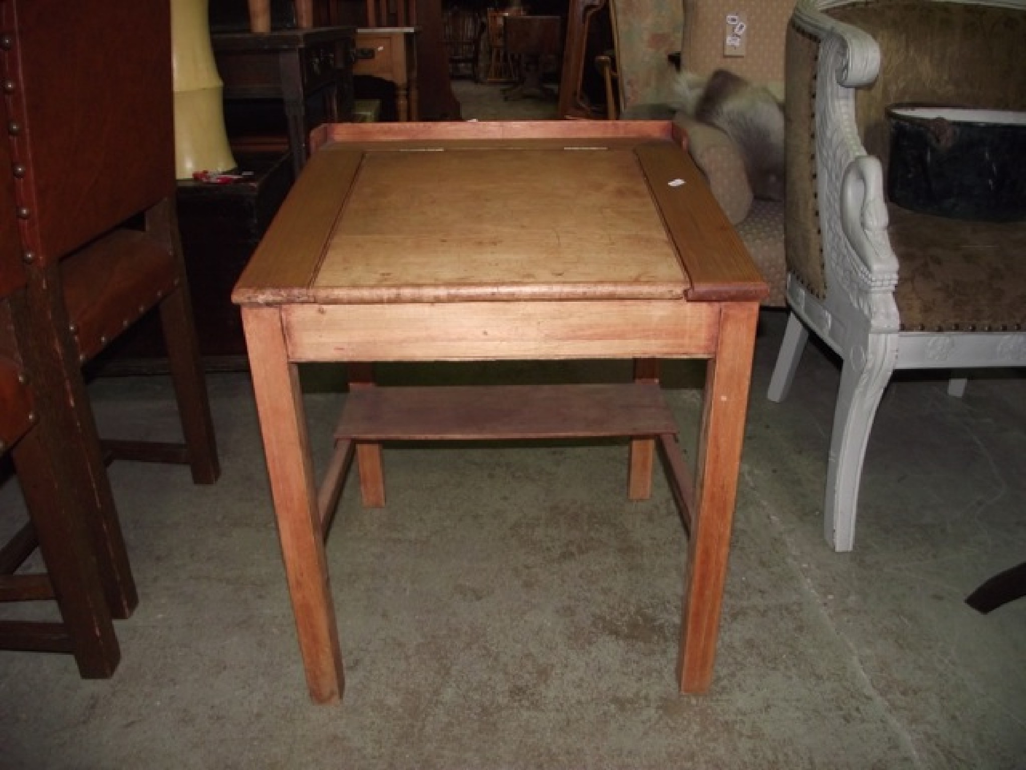 Appraisal: A vintage stripped pine child's school desk with hinged slope