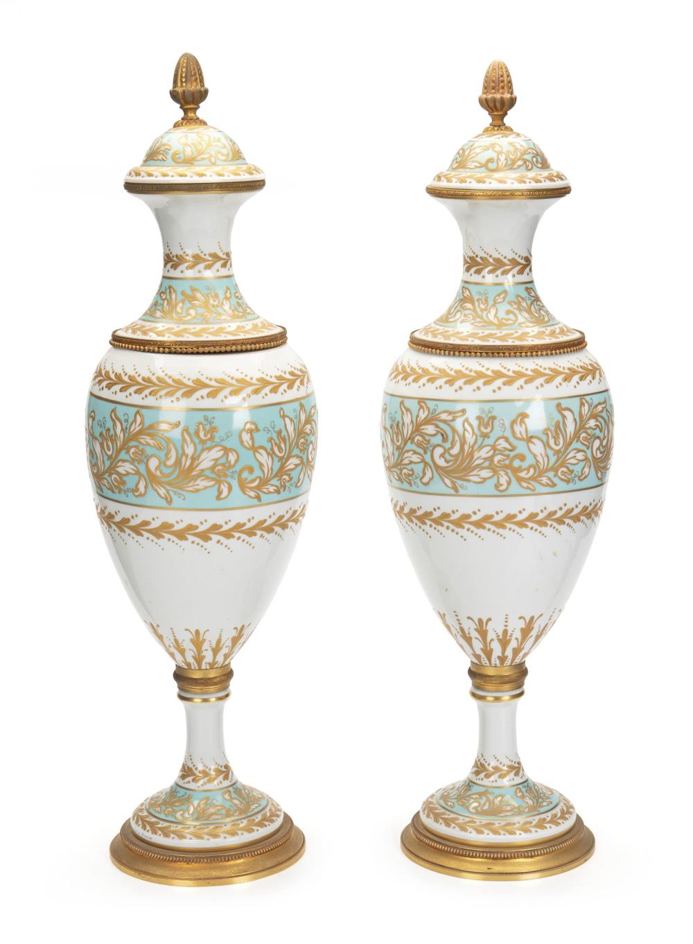 Appraisal: A pair of S vres-style urns th Century Marked Marbro