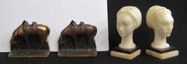 Appraisal: Two pair bookends including marble heads and bronze horses