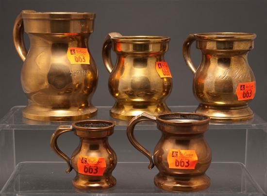 Appraisal: Three brass baluster-shaped measures and two copper baluster-shaped measures second