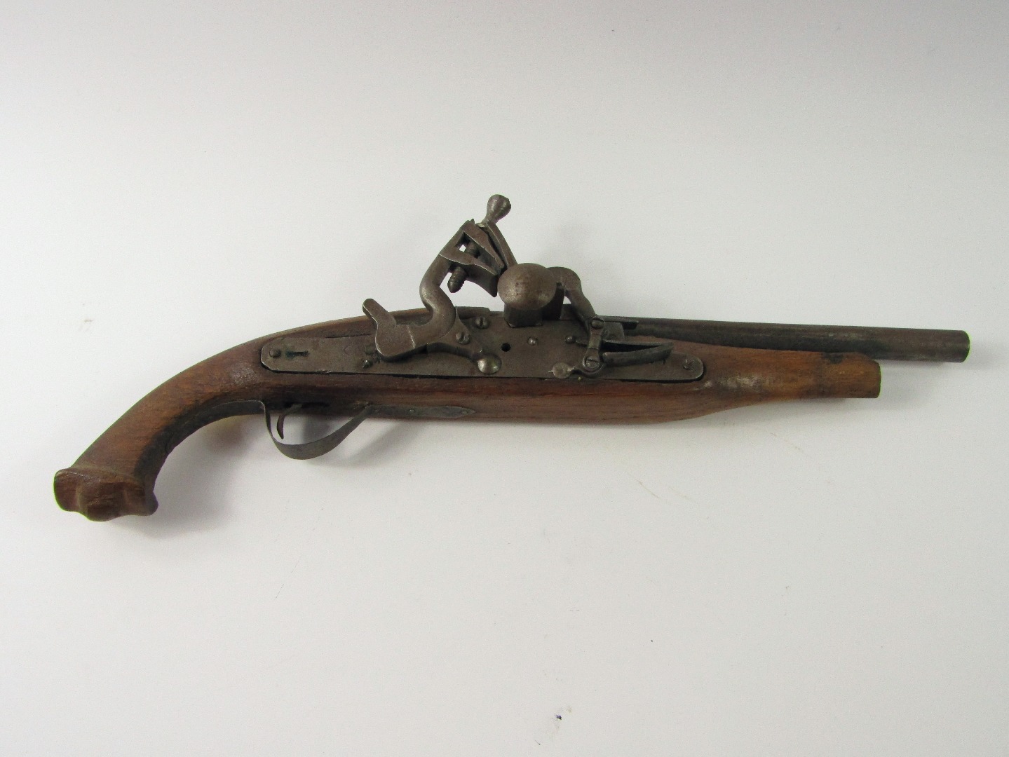 Appraisal: A flintlock pistol with horn inlay cm long