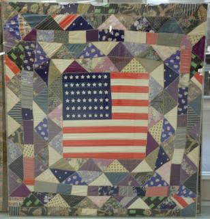 Appraisal: Patriotic crazy quilt center flag silk and rayon triangle crazy