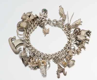 Appraisal: A Vintage Sterling Silver Charm Bracelet Sterling silver curb link