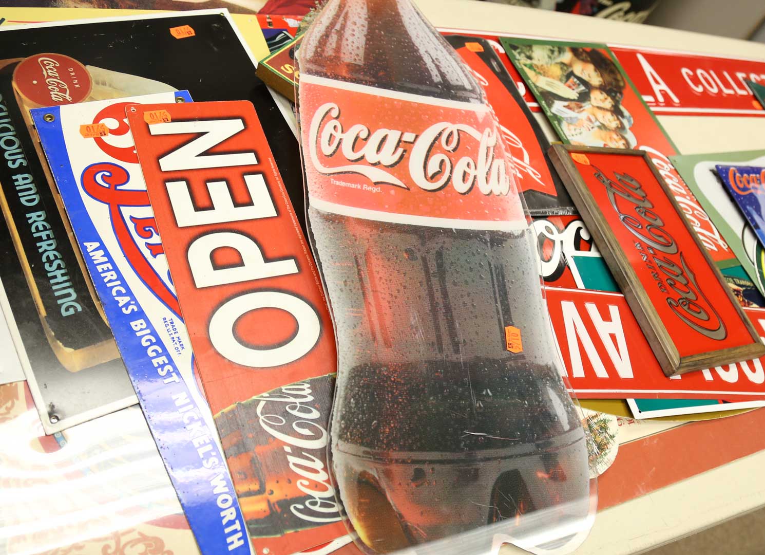 Appraisal: Assortment of Coca-Cola signs and posters Undernumber