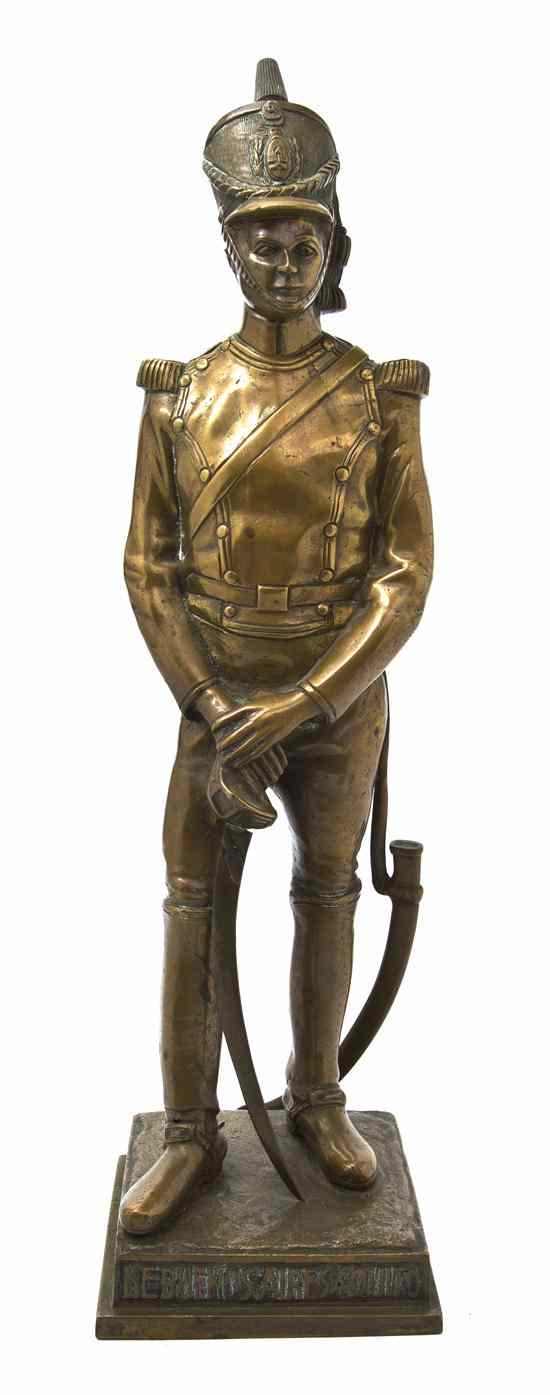 Appraisal: A Continental Bronze Figure De Buenos Aires Aquito depicting a