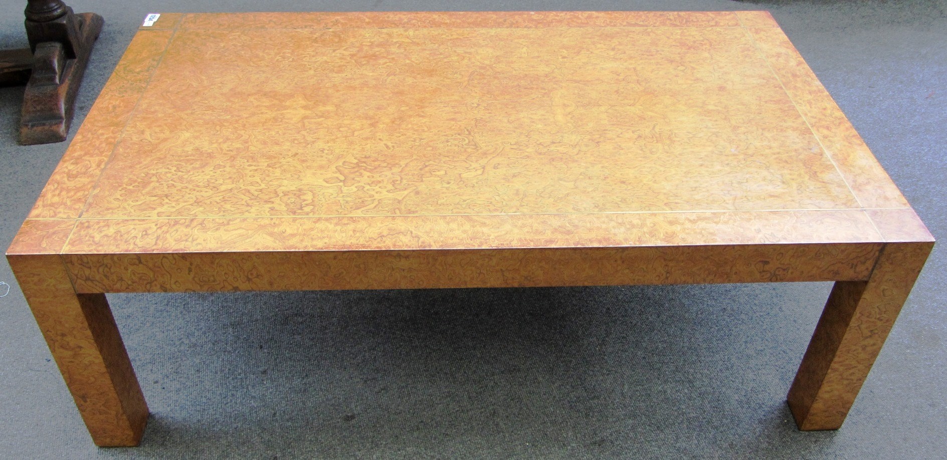 Appraisal: A th century burr ash rectangular coffee table on square