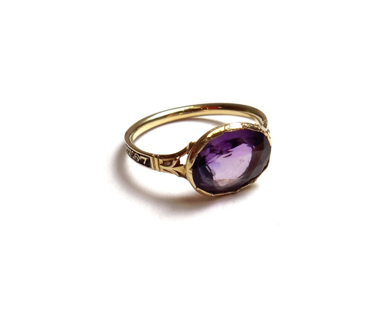 Appraisal: A gold and amethyst set mourning ring collet set with