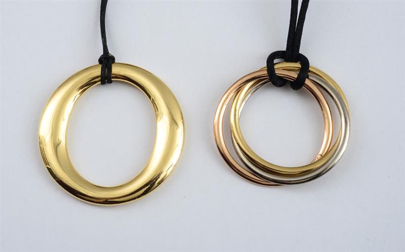 Appraisal: TWO K GOLD PENDANTS TIFFANY CO AND CARTIER Round pendant